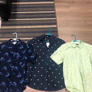 Medium-Large button down Hawaiian looking shirts